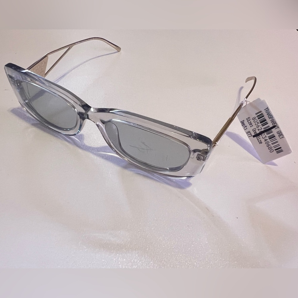 PRADA 14YS 12R50K Symbole Sunglasses
Women's Transparent Shades